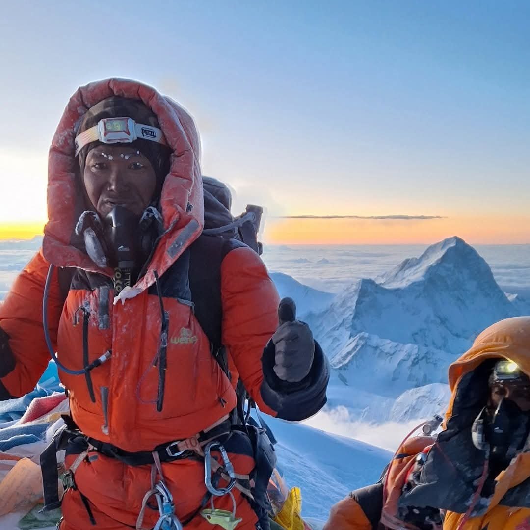 Pasang Sherpa on the summit of Mount Everest at sunrise